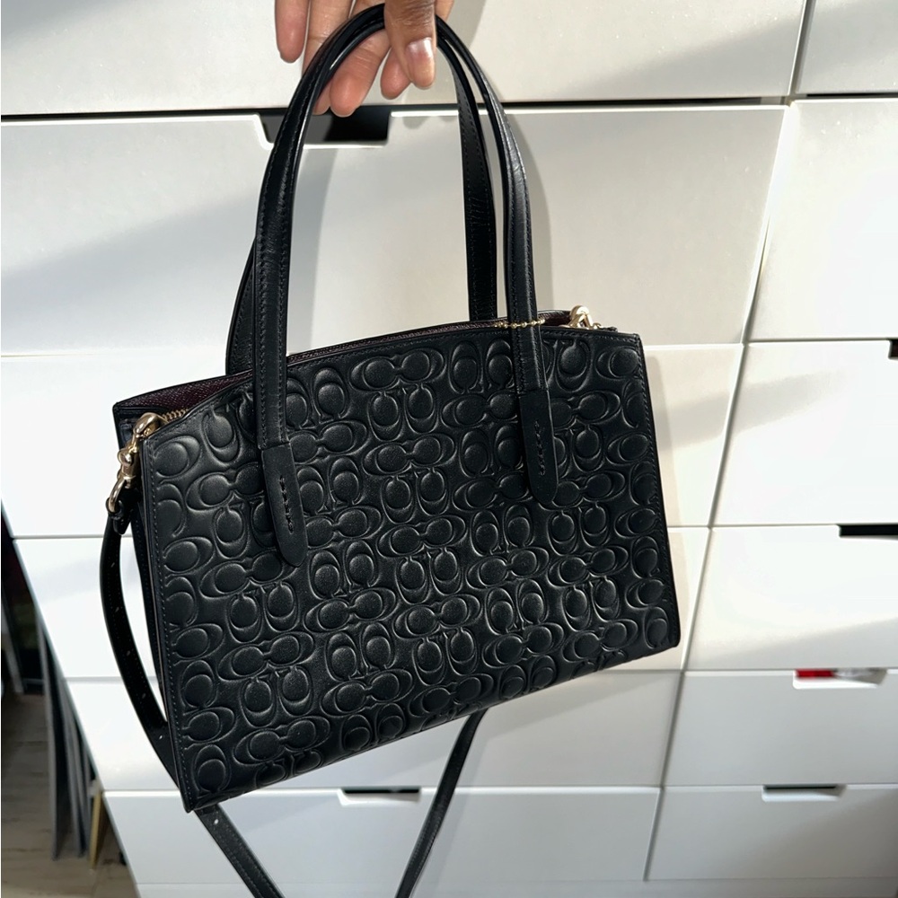 Black leather Coach bag